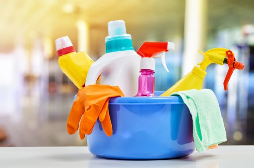 Cleaning team following chemical safety and PPE guidance