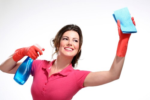 Westkensington office cleaning team sanitising desks and shared surfaces