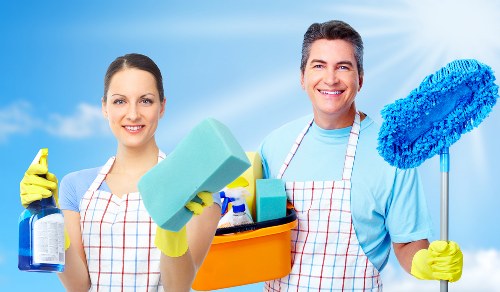 Cleaner assessing a mixed household clearance in a Westkensington flat