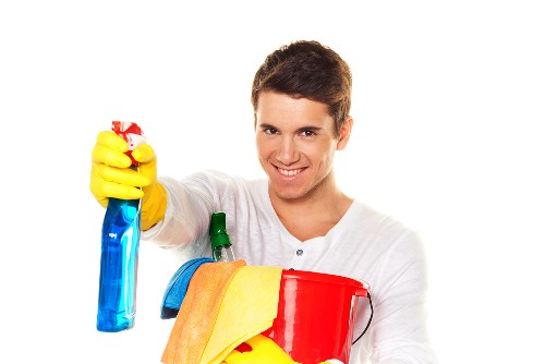 Cleaner windows and frames in a West Kensington property